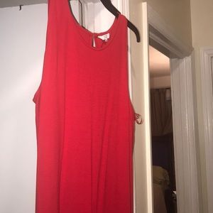 Red sleeveless dress with tassels at the bottom